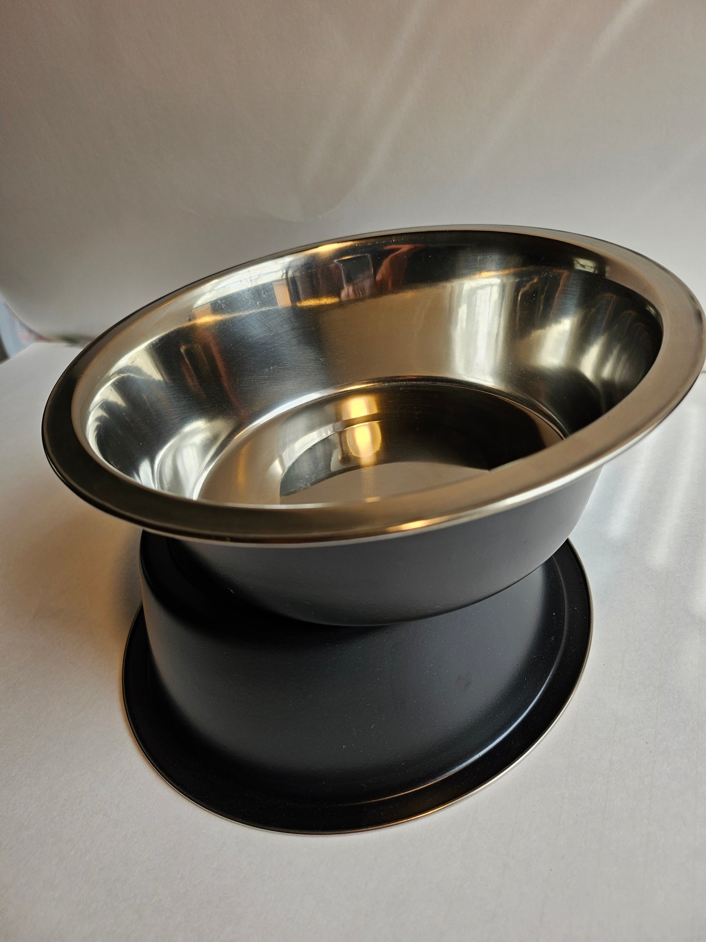 Stainless steel large pet feeding bowls for dogs and cats .