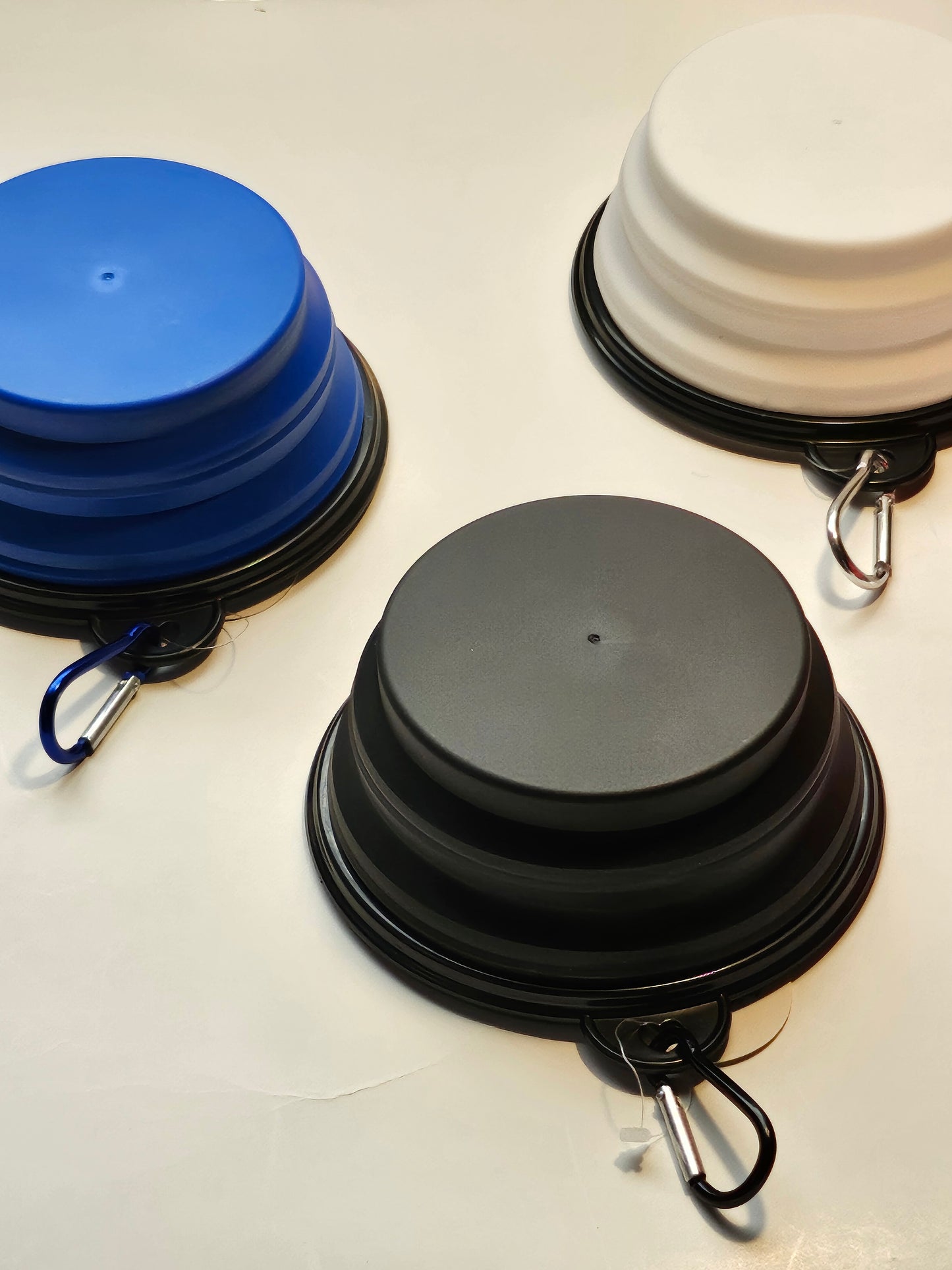 2 pack matching collapsible travel pet bowls with hooks.