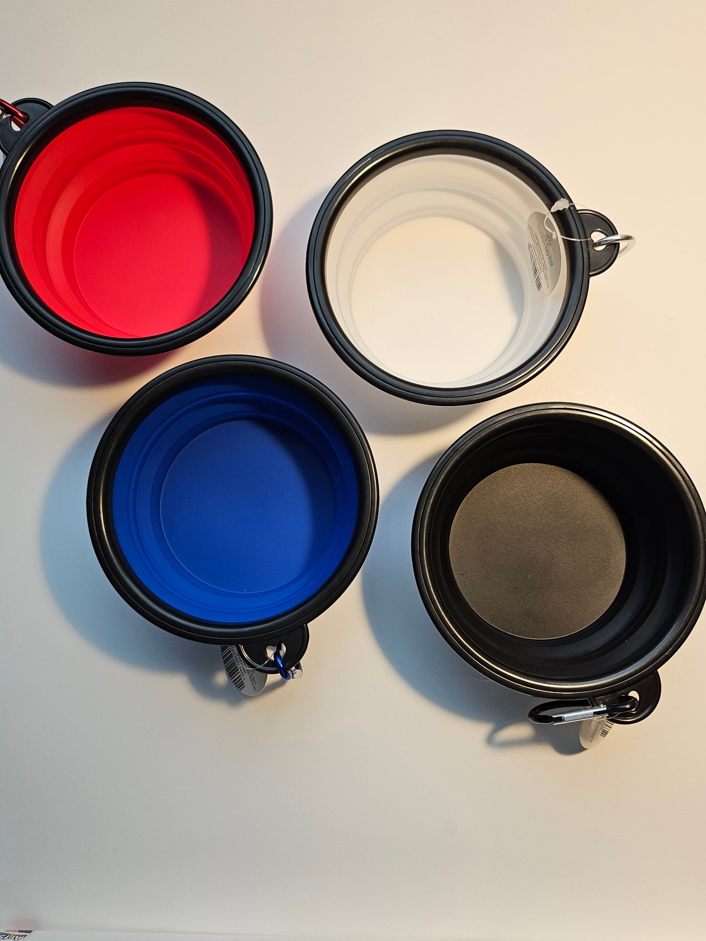 2 pack matching collapsible travel pet bowls with hooks.