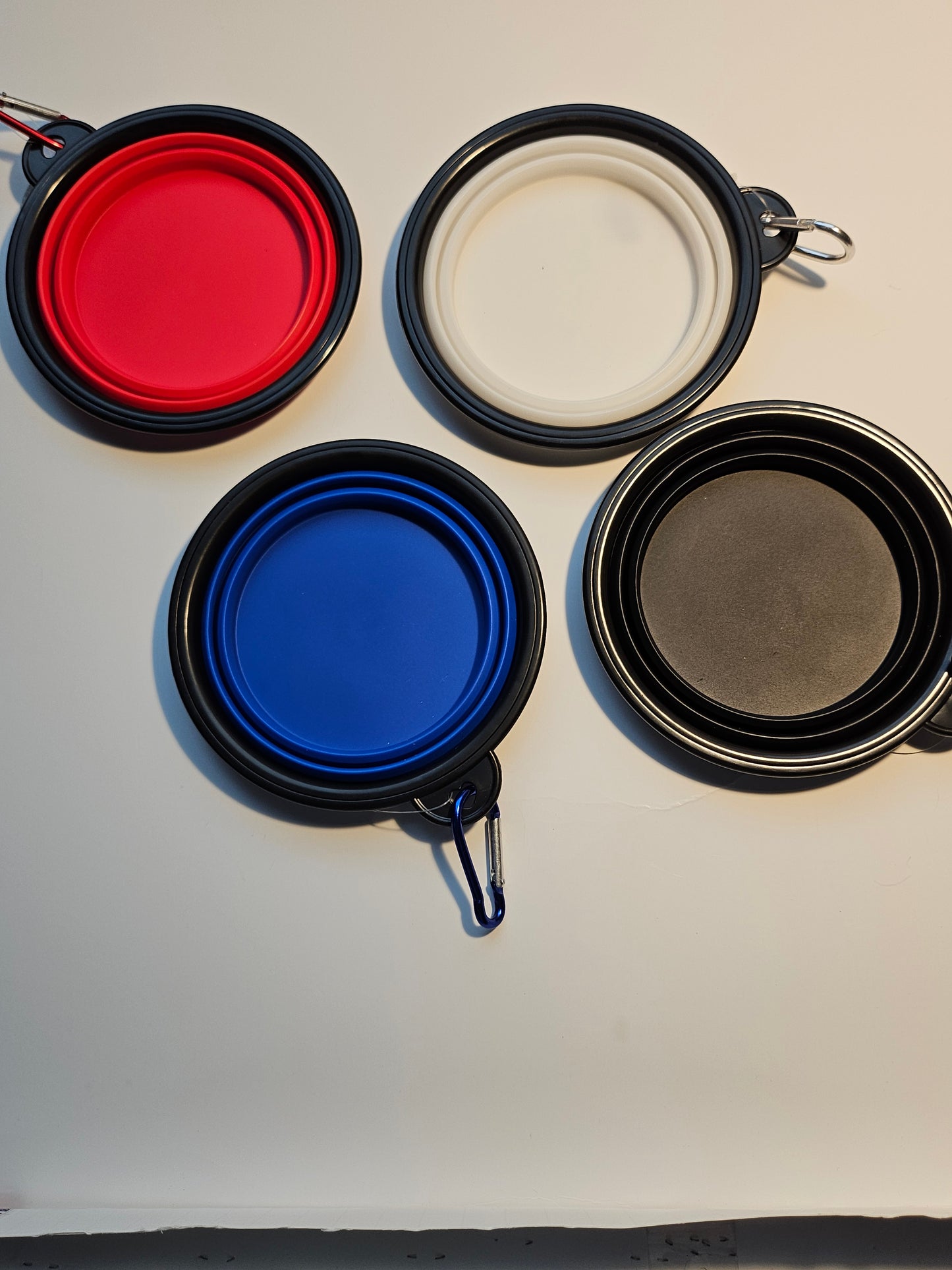 2 pack matching collapsible travel pet bowls with hooks.