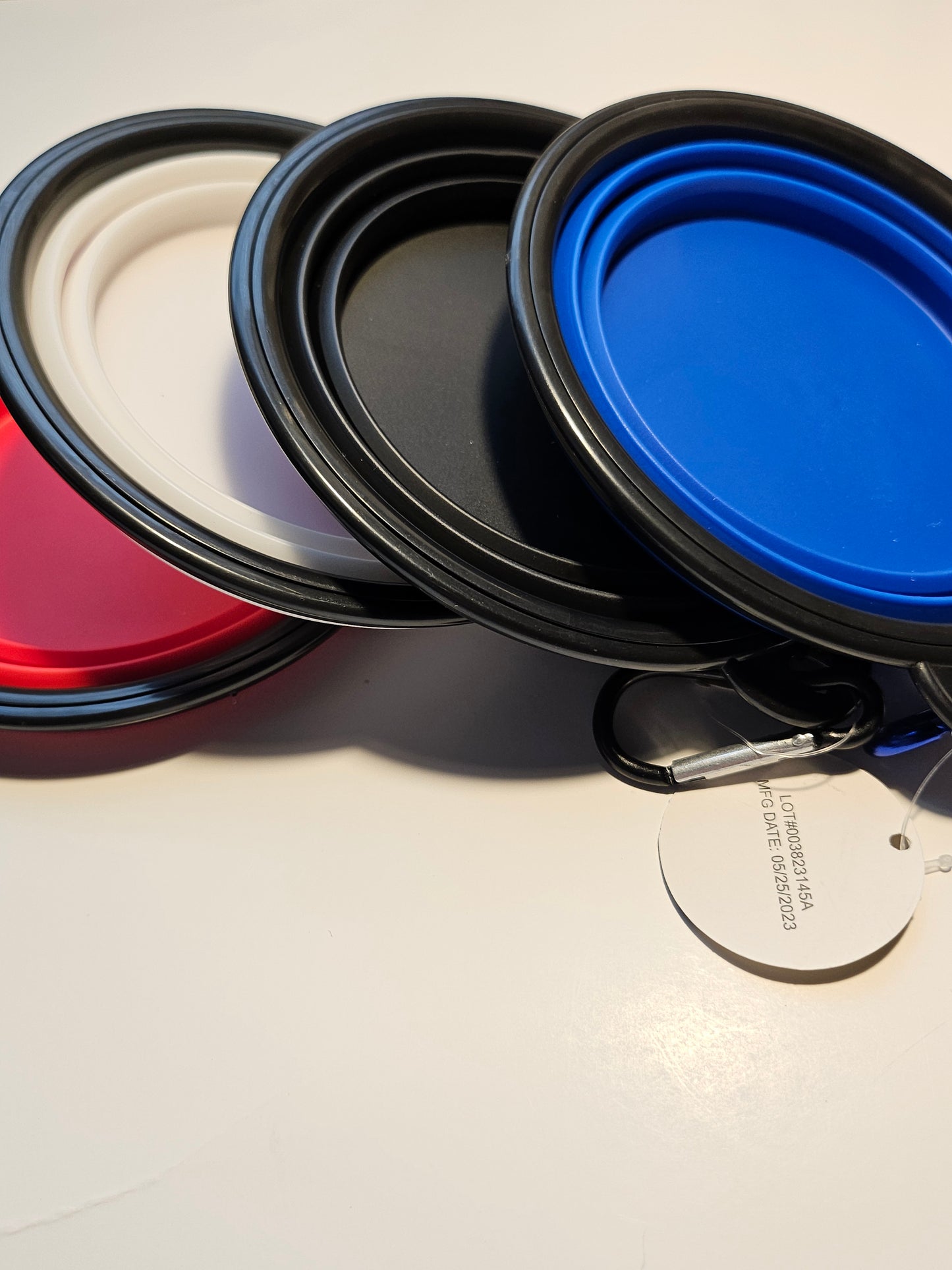 2 pack matching collapsible travel pet bowls with hooks.